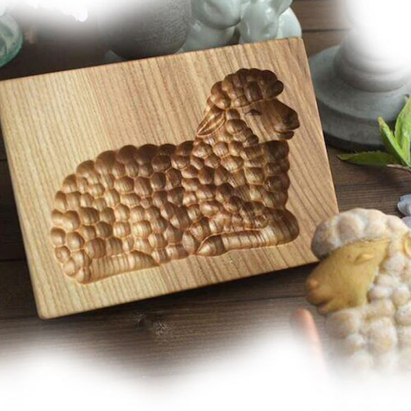 Holz-Keksform mit handgeschnitzten Tiermotiven