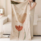Kuscheldecke mit Blütenmuster aus Baumwolle
