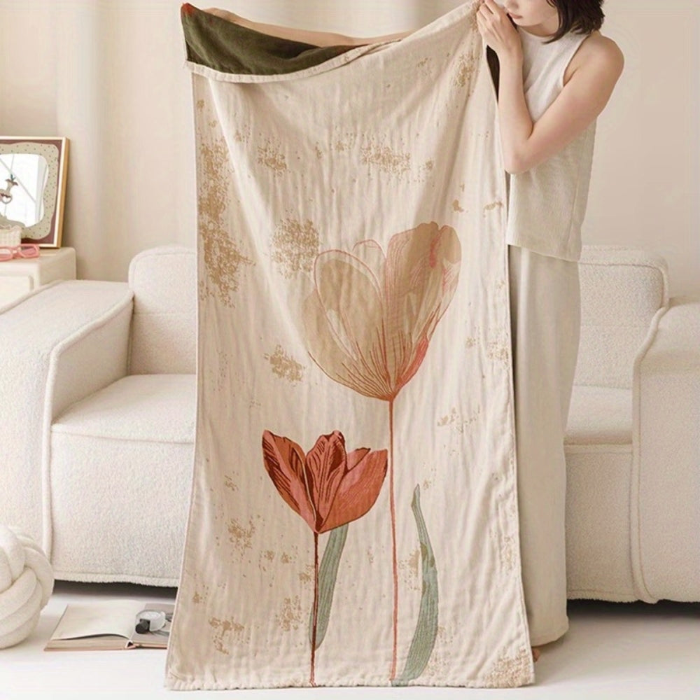 Kuscheldecke mit Blütenmuster aus Baumwolle