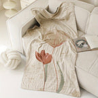 Kuscheldecke mit Blütenmuster aus Baumwolle