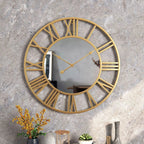 Wanduhr aus Metall mit Spiegelelementen