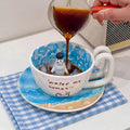 Keramiktasse mit Robben-Figur und Ozeanwellen-Design