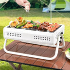 Klappbarer Holzkohlegrill aus Metall mit umklappbaren Griffen